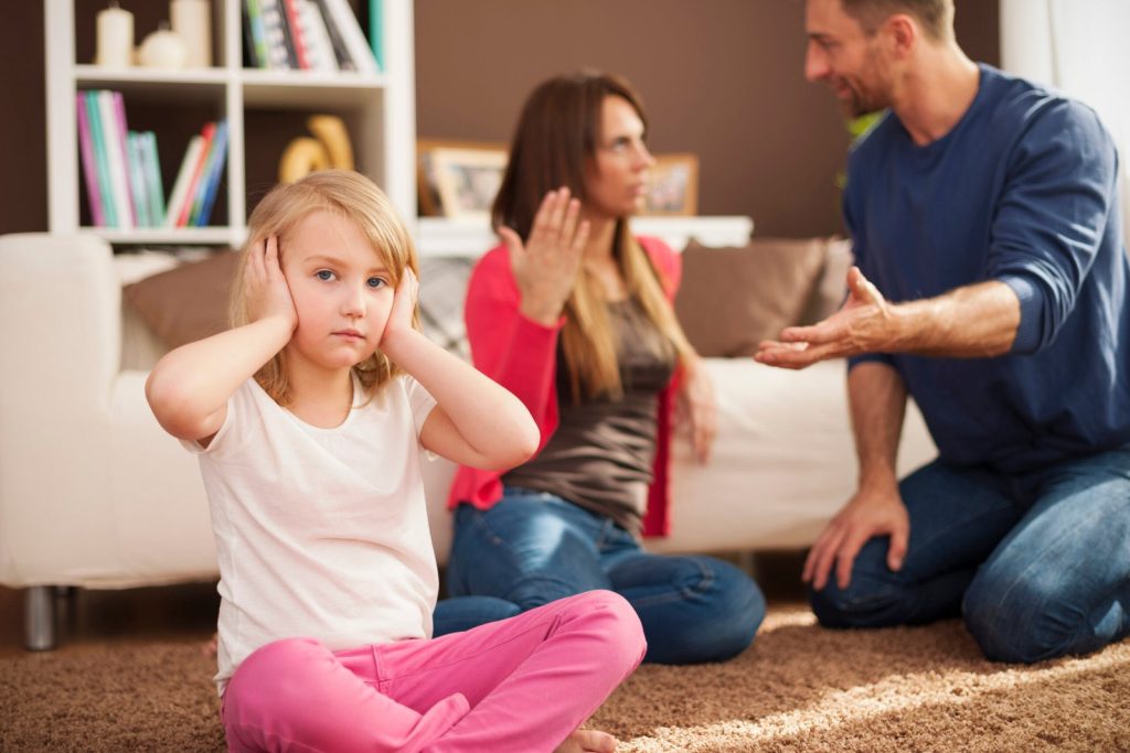 little-girl-doesn-t-want-to-hear-arguing-of-parents-scaled
